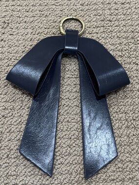 Leather bows/bag charm
